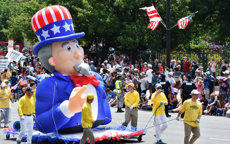 An inflatable caricature of Uncle Sam is pulled down the Independence Day parade route on July 4, 2024, in Washington, D.C.