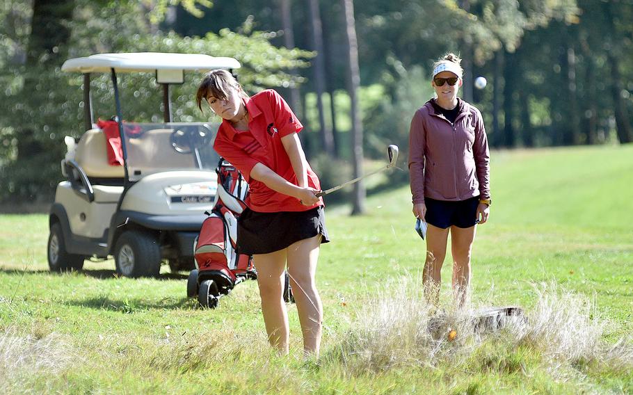 Kaiserslautern senior Reigen Pezel chips out of the rough on Woodlawn Golf Course's 11th hole during the second round of the DODEA European golf championships on Oct. 13, 2023, on Ramstein Air Base, Germany. Pezel took runner-up honors.