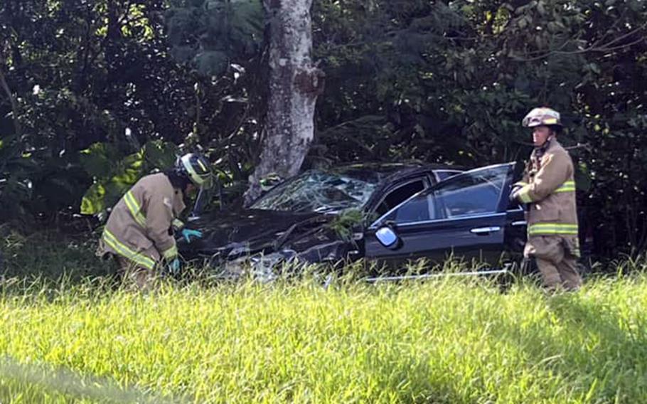 Paramedics and first responders work the scene of a single-car accident near Gate 3 inside Kadena Air Base, Okinawa, Aug. 5, 2024.