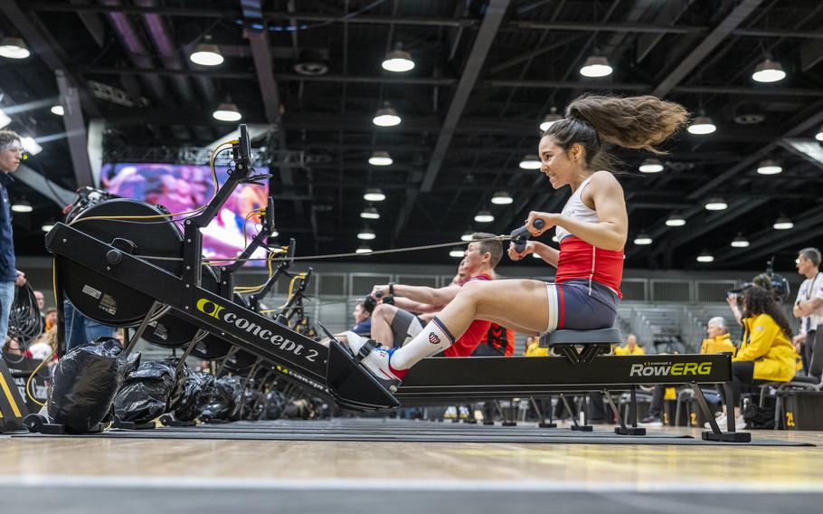 A competitor competes in indoor rowing