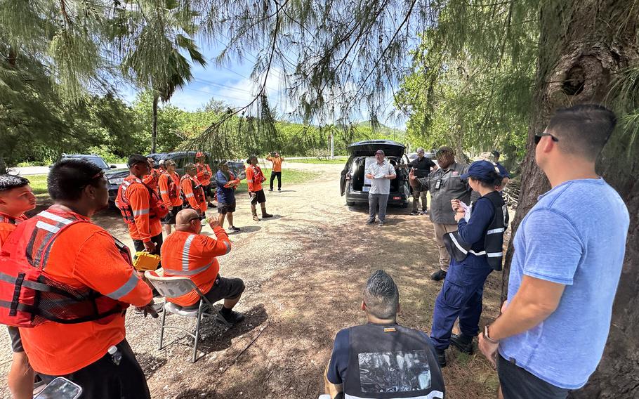 Evaluators and participants from the Oil Spill Response Operations Co. debrief following an oil spill response exercise off Saipan on June 26, 2024.