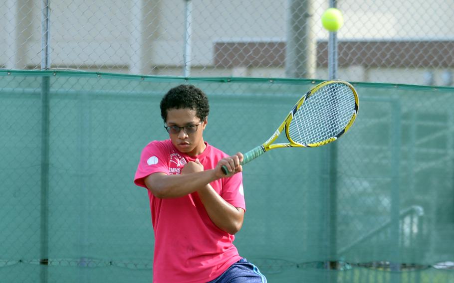 Sophomore Gabe Simpkins and five other players form three pairs of brothers on Zama’s tennis team.