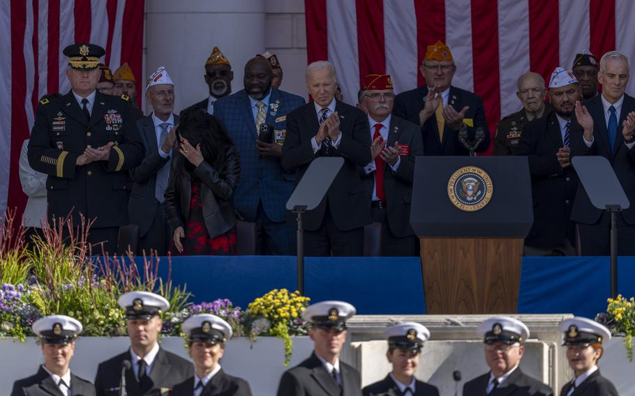 President Joe Biden, top center, attends the National Veterans Day Observance 