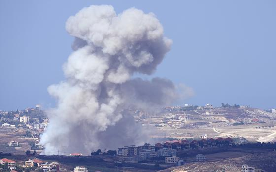 Smoke rises over the Nabatiyeh district of Lebanon after Israeli airstrikes on villages in the region on Sept. 23, 2024.