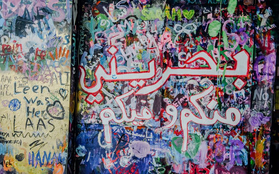 Passion Art Cafe in Budaiya, Bahrain, has a graffiti wall that customers can decorate. From bold Arabic calligraphy to vibrant splashes of color, the artwork stands as a testament to the creativity the cafe aims to inspire.