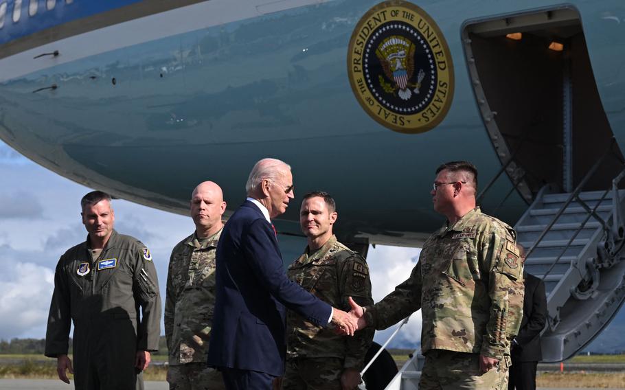 U.S. President Joe Biden shakes hands with service members as he walks to board Air Force One after delivering remarks on the 22nd anniversary of the September 11, 2001, terrorist attacks, at Joint Base Elmendorf-Richardson in Anchorage, Alaska, on Sept. 11, 2023.