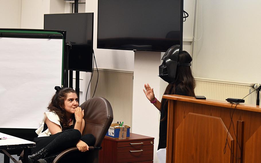 Darth Vader, portrayed by Grafenwoehr Elementary School fourth grader Gabby Theadore, takes the witness stand during the mock trial of Luke Skywalker in the 8th Judicial Circuit courtroom at Rose Barracks in Vilseck, Germany, on May 20, 2024.