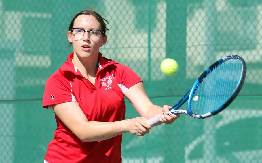 Autumn Hendra hits a backhand.