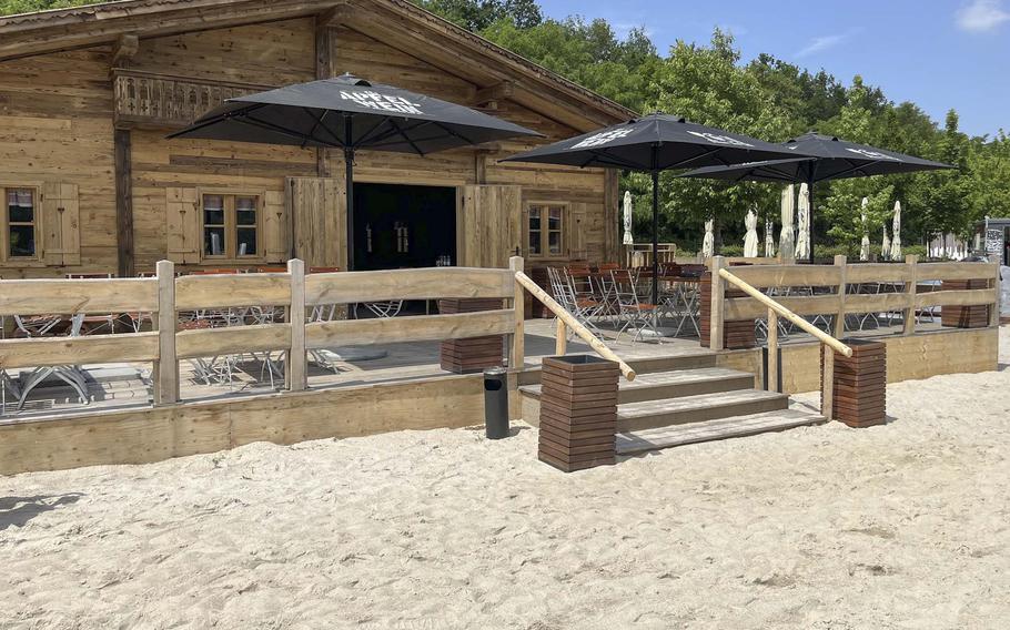 The beer garden is one of many recreation areas at Pinta Beach on the Raunheimer Waldsee in Germany. This photo was taken during the opening week of the 2024 season at the privately owned beach near Frankfurt Airport.