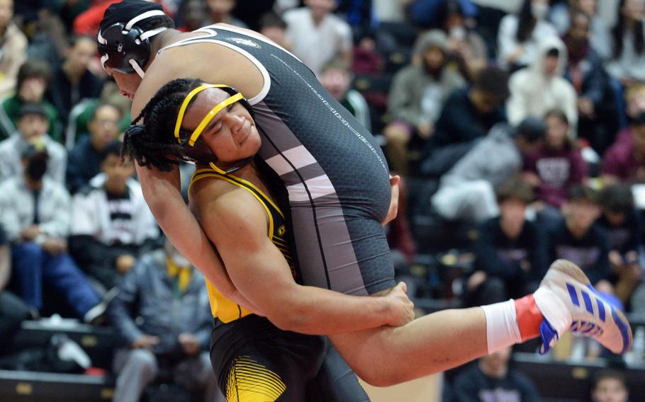 Kadena senior Jeremiah Drummer repeated as a Far East wrestling champion and also helped the Panthers win a Division I football crown.