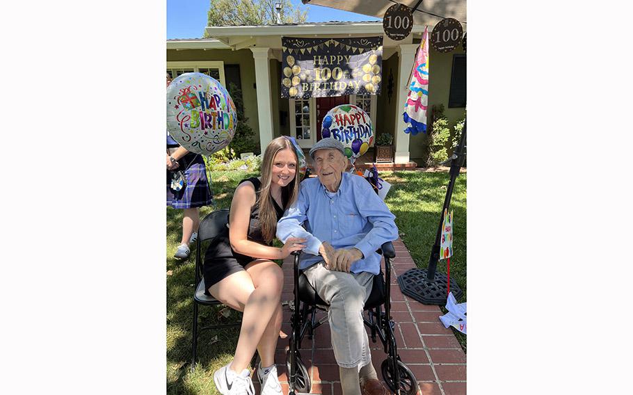 Robert Moore with his granddaughter, Emma.