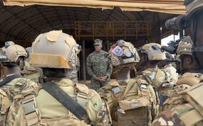 Marine Corps Gen. Michael Langley, head of U.S. Africa Command, talks with Somali troops in Mogadishu on Sept. 10, 2024. U.S. troops returned to Somalia in 2022 in an advisory capacity, two years after then-President Donald Trump pulled hundreds of U.S. service members out of the country.