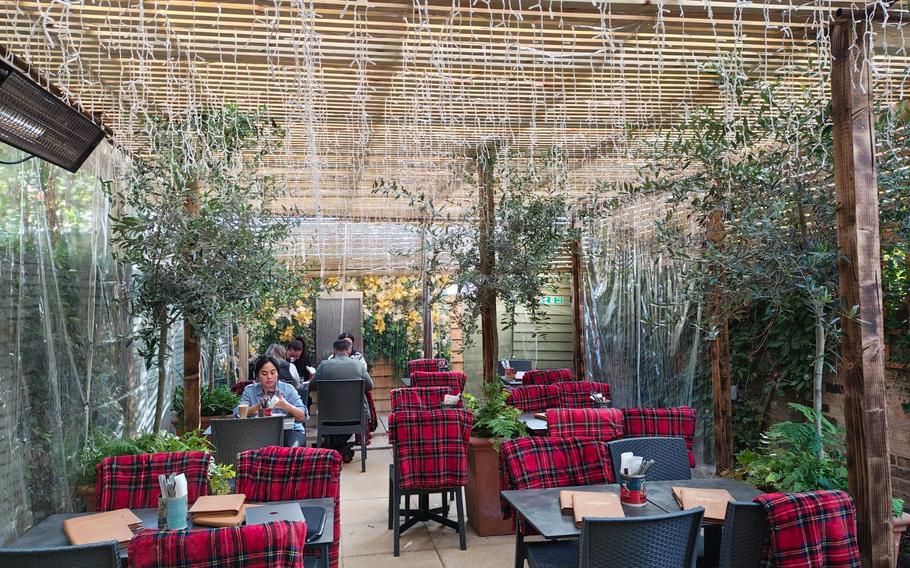 Limoncello is a family-owned restaurant and deli in Cambridge, England, that's been in business since 1977. The outdoor patio features grassy walls and fairy lights, creating an intimate ambience.