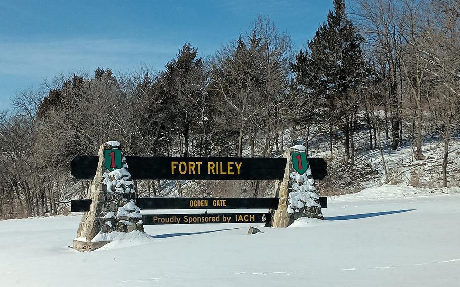 Snow lies about the Ogden Gate for U.S. Army Garrison Fort Riley in Kansas. The wife of a Fort Riley soldier who died Monday, Feb. 19, 2024, has been arrested and charged with second-degree murder in the death of her husband.