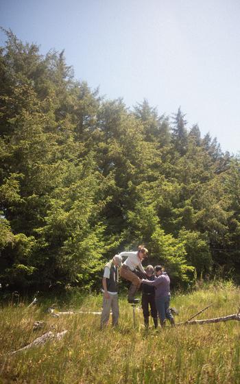 Scientists take core samples from sediment.