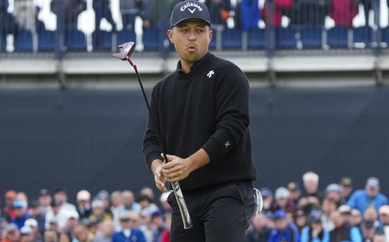 Xander Schauffele of the United States reacts to his putt on the 10th green during his final round of the British Open Golf Championships at Royal Troon golf club in Troon, Scotland, Sunday, July 21, 2024. (AP Photo/Jon Super)