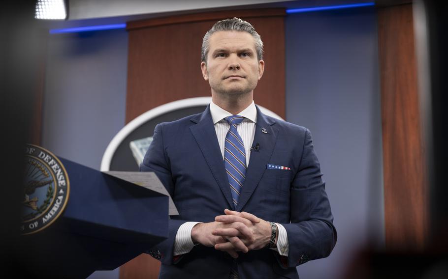 Hegseth standing at a podium at the Pentagon. 