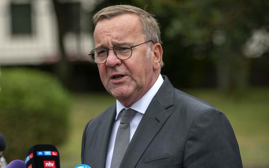 German Defense Minister Boris Pistorius speaks outside during a gathering at Ramstein Air Base.