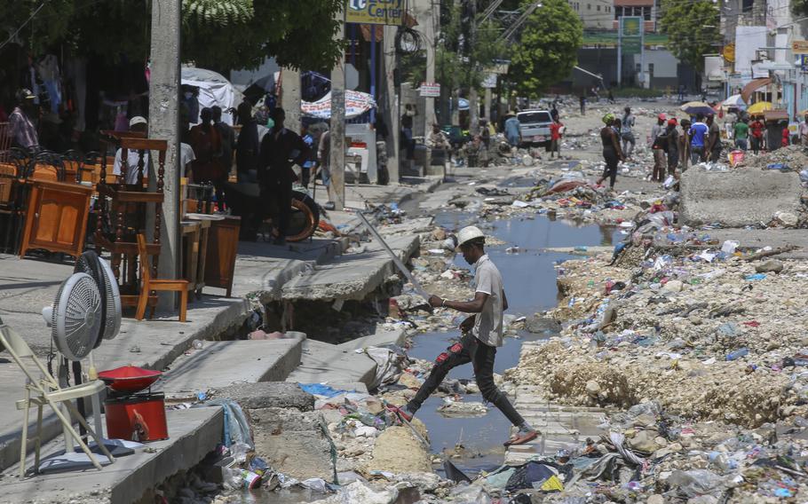 A storm drain filled with trash in Haiti