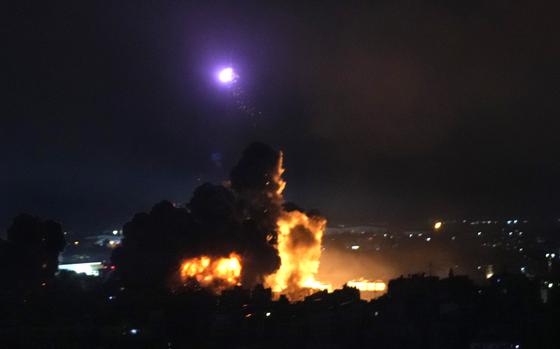 Flames rise from Israeli airstrikes in Dahiyeh, Beirut, Lebanon, Friday, Oct. 4, 2024. (AP Photo/Hussein Malla)