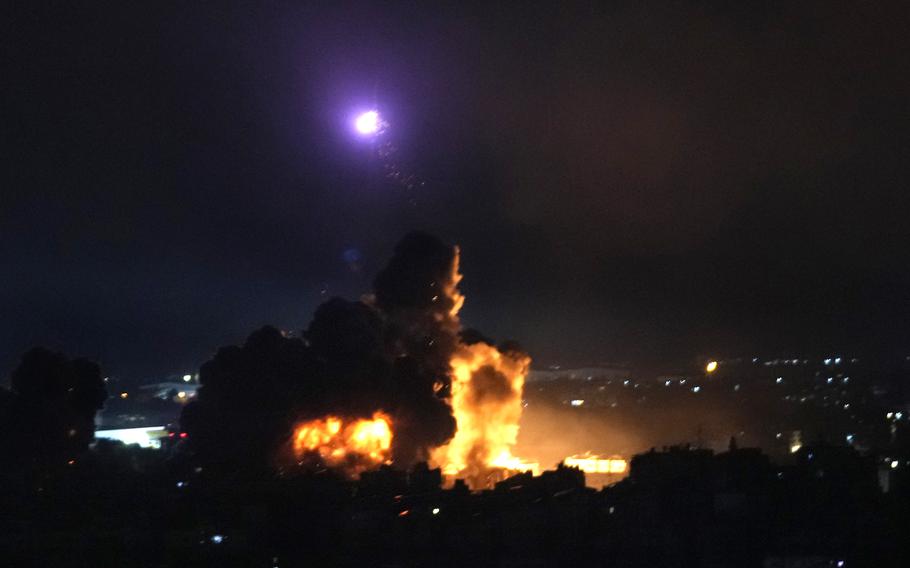 Flames rise from Israeli airstrikes in Dahiyeh, Beirut, Lebanon, Friday, Oct. 4, 2024. 