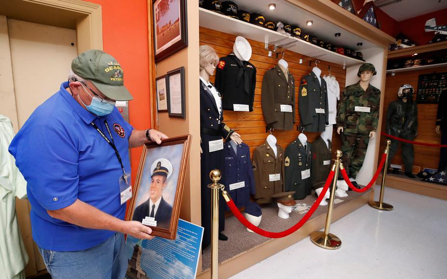 The Veterans Museum and Education Center has finally found a permanent home in the historic Cornelia Young Library in Daytona Beach.  Pictured is museum volunteer Richard Lyons getting artifacts ready for the move out of the museum's old Beach Street location last year, when the nonprofit moved to Holly Hill.