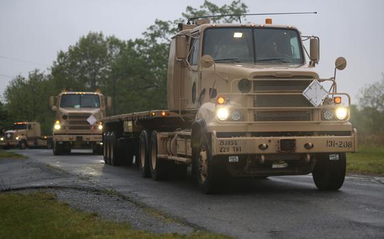 Soldiers drive M915 tractor trucks in a cross-country convoy in the U.S. in May 2024. Three U.S. Army transport trucks collided on highway A6 near Ansbach, Germany. Four people, including three service members, were injured during the accident.