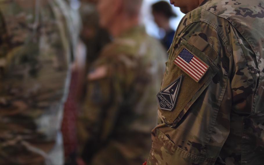 Guardians display their U.S. Space Force patches during a change of command ceremony Aug. 13, 2024, at Ramstein Air Base, Germany.