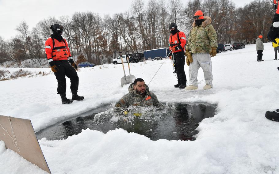 An airman participates in a cold-water immersion