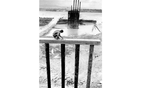 South Vietnam, August, 1967:  A Seabee from Naval Mobile Construction Battalion 4 works on the "Liberty Bridge" across the Thu Bon River, 20 miles south of Da Nang. The 2,040-foot span in the An Hoa Valley was designed to support up to 60 tons, allowing the free movement of the heaviest military equipment through the hotly-contested area.

Looking for Stars and Stripes’ coverage of the Vietnam War? Subscribe to Stars and Stripes’ historic newspaper archive! We have digitized our 1948-1999 European and Pacific editions, as well as several of our WWII editions and made them available online through https://starsandstripes.newspaperarchive.com/