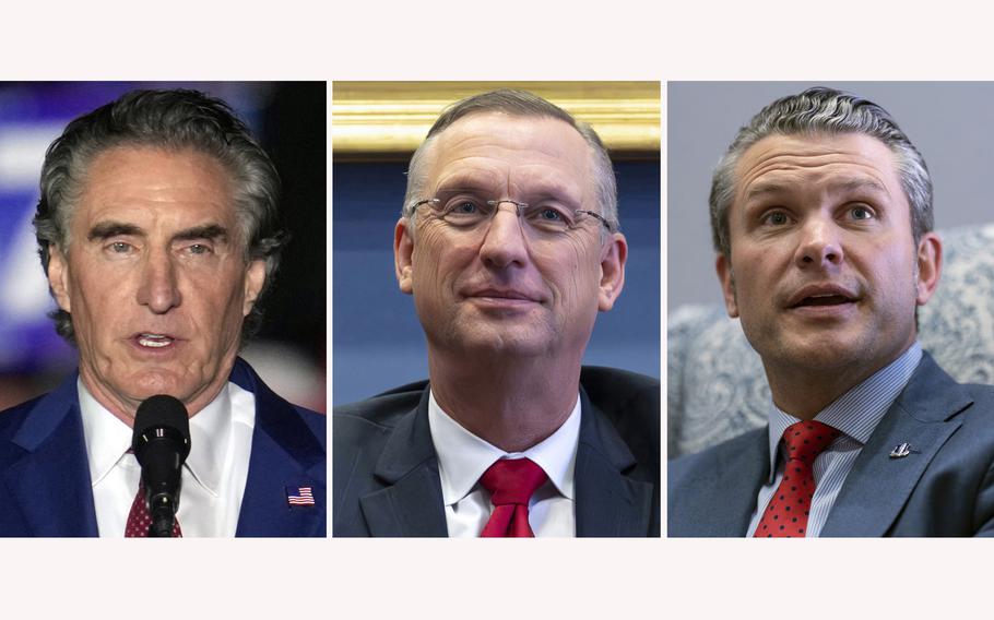 Interior Department nominee North Dakota Gov. Doug Burgum, from left, Secretary of Veterans Affairs nominee Doug Collins and Defense Secretary nominee Pete Hegseth. 