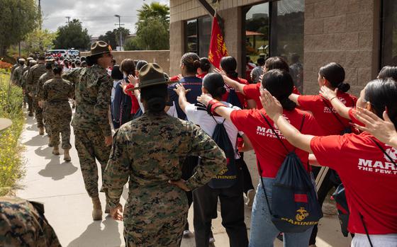 U.S. Marine Corps drill instructors with Marine Corps Recruit Depot San Diego hike with poolees and guests during an all-female pool function at Marine Corps Base Camp Pendleton, Calif.