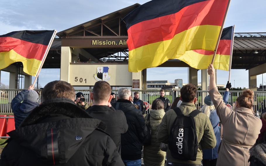 People protest outside a U.S. Air Force base in Germany.