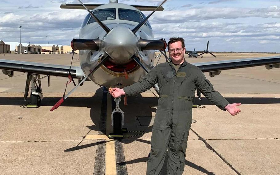 Senior Airman Sean “Ryan” Stevenson poses in front of an airplane in this undated photo. Stevenson died by suicide Nov. 1, 2023, at Cannon Air Force Base, N.M., his father said in an open letter to Pentagon officials posted on Reddit. 