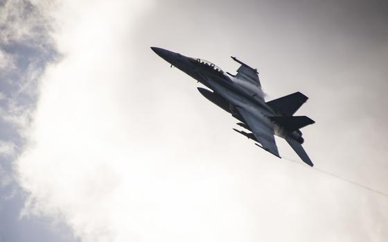 An F/A-18 takes flight from the aircraft carrier USS Ronald Reagan in the Philippine Sea in 2017. The Navy spent roughly $4 million more than it should have to repair radar systems on its F/A-18 Hornet fighter jets, according to a Defense Department audit. 

