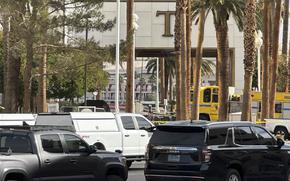 Police block the area after a vehicle caught fire and exploded outside the lobby of President-elect Donald Trump's hotel Wednesday, Jan. 1, 2025.   (AP Photo/Ty ONeil)