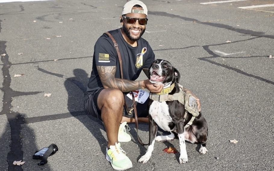 Dave Crenshaw, a former master sergeant in the Army National Guard, pictured with Doc, his 7-year-old service dog.