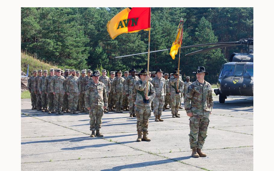 Members of the 1st Infantry Division’s 1st Combat Brigade case their colors, and the 1st Air Cavalry Brigade uncased theirs during a Transfer of Authority ceremony at Powidz, Poland, as seen in a July 11, 2024, post.