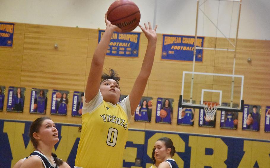 Yareli Telles puts up a shot.