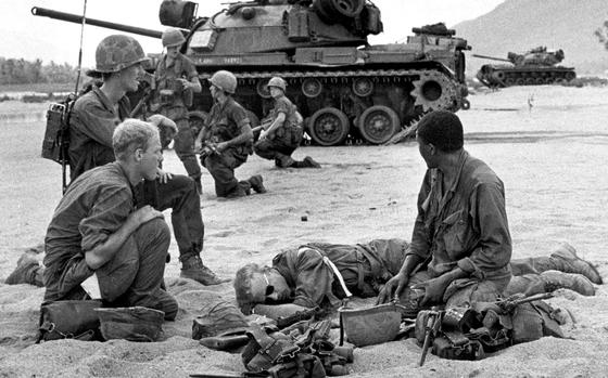 HED: Shielding the wounded, 1967

An Lao Valley, Vietnam, April 1967: Two tanks from 1st Platoon, A Company, 60th Armored Cavalry move in to help soldiers shield a wounded comrade during fighting along a riverbank in the An Lao Valley in 1967. 

Read more at: https://www.stripes.com/migration/an-lao-a-beautiful-scenic-rice-rich-and-deadly-valley-1.318091

Looking for Stars and Stripes’ coverage of the Vietnam War? Subscribe to Stars and Stripes’ historic newspaper archive! We have digitized our 1948-1999 European and Pacific editions, as well as several of our WWII editions and made them available online through https://starsandstripes.newspaperarchive.com/

META TAGS: South Vietnam; Vietnam War; U.S. Army; 