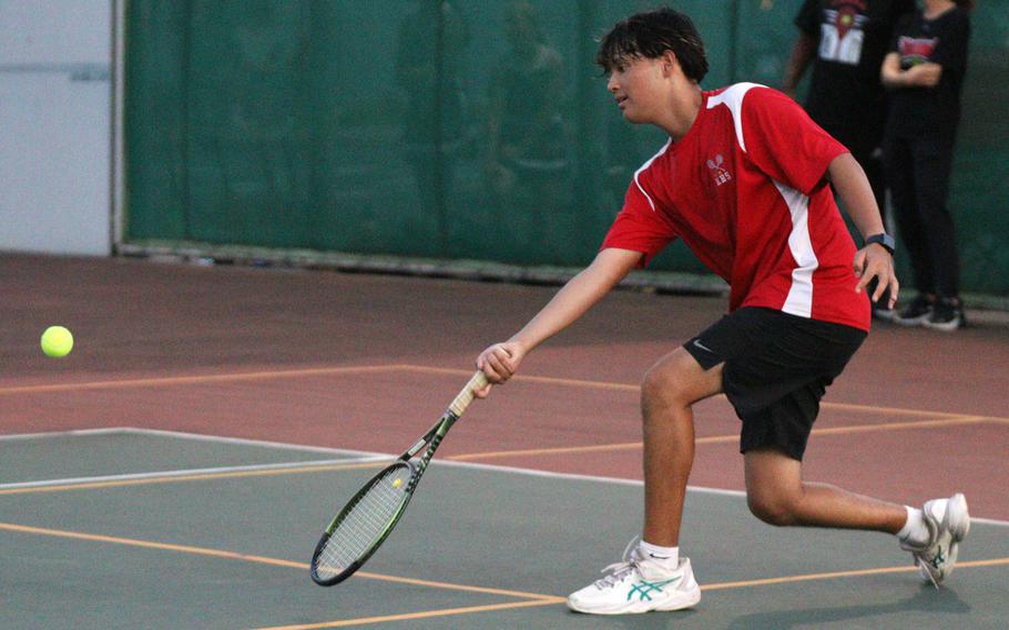 Aaden Otteson plays tennis.