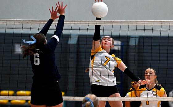 Vicenza's Alexandra Nelson taps the ball back over the net against Black Forest Academy's Hannah Kooima in the Division II final the DODEA-Europe volleyball championships at Ramstein Air Base, Germany, Nov. 2, 2024. Vicenza won 26-24, 13-25, 25-17, 25-18.