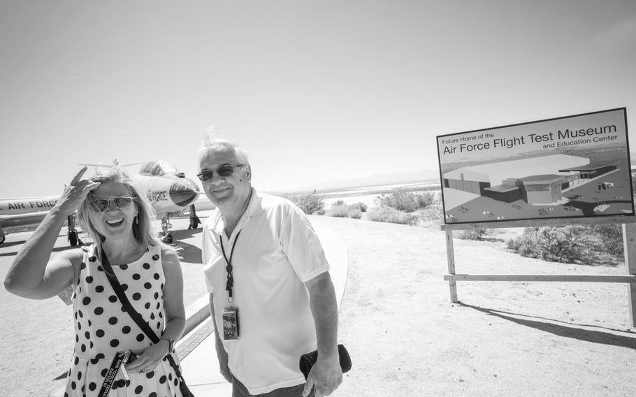 George Welsh, Air Force Flight Test Museum cirector, and Lisa Brown, the director of education and community outreach for the Flight Test Museum Foundation stand in front of the site of the new museum.