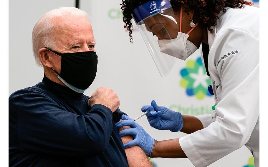 Then President-elect Joe Biden receives a COVID-19 vaccination in Newark, Del., on Dec. 21, 2020. Biden said on Friday, Aug. 25, 2023, the White House would request additional money from Congress to fund the next round of coronavirus vaccine shots. 