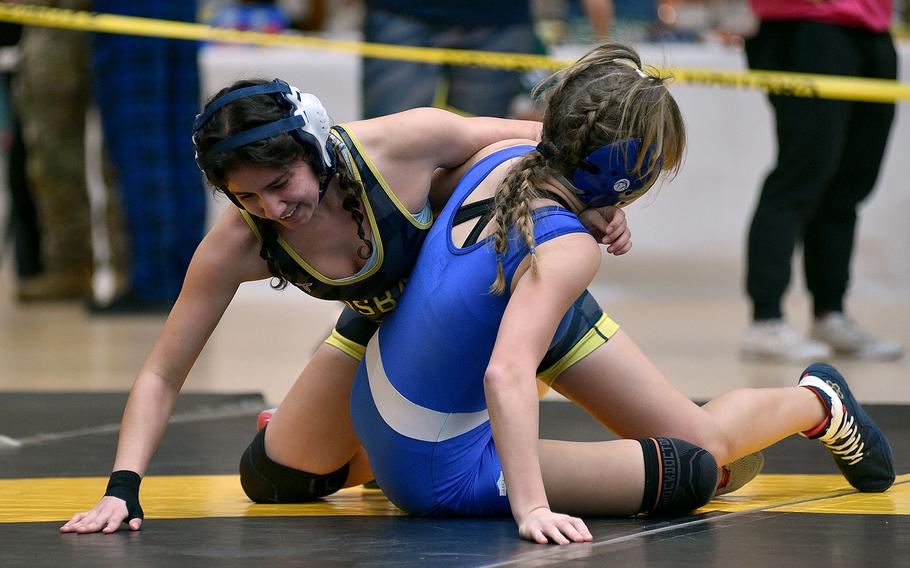 Abigail Castillo tries for a pin.