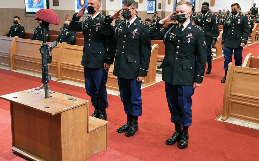 U.S. Army paratroopers of 1st Battalion, 503rd Infantry Regiment, 173rd Airborne Brigade give a last salute to Pfc. Ian N. Morosoff, who died May 1 from injuries sustained in a car accident, at Caserma Ederle, Vicenza, Italy, May 24, 2021.