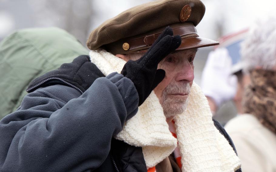 Battle of the Bulge U.S. veteran David Marshall salutes during a ceremony