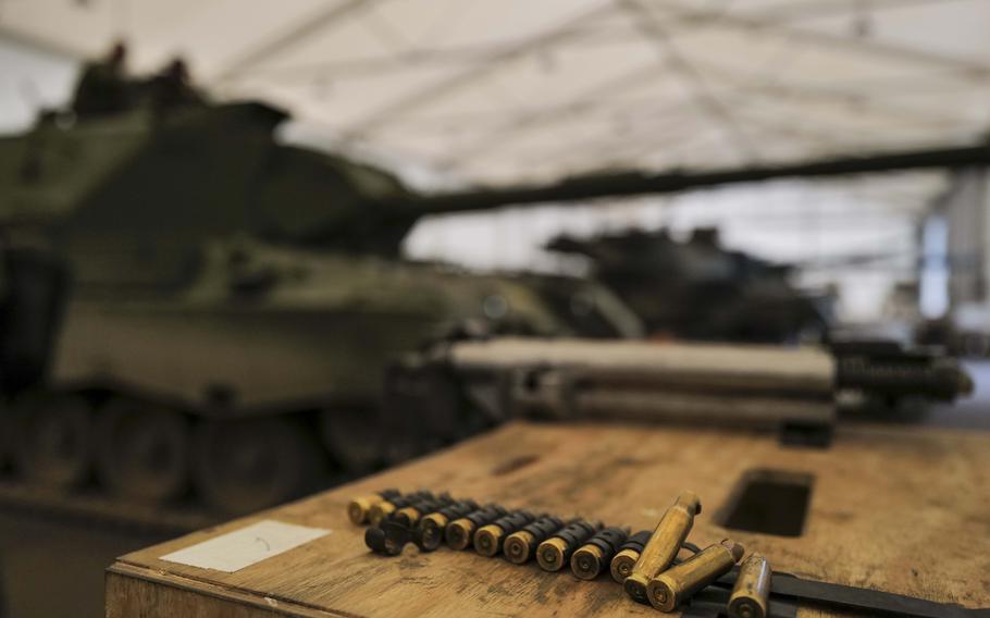 Training shells sit next to a Leopard 1 A5 