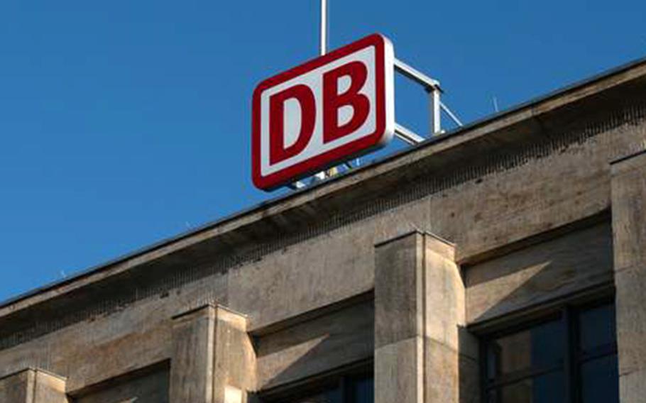 A Deutsche Bahn sign on a building in Germany.