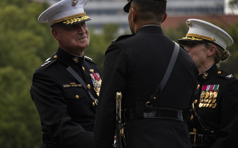 Lt. Gen. Bradford Gering, Deputy Commandant for Aviation, greets Barracks Marines during a Sunset Parade at the Marine Corps War Memorial, Arlington, Va., July 23, 2024. 